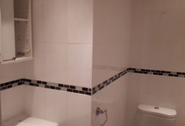 cupboard imposing into bathroom