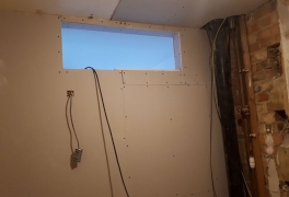 wall reinstated with opening for window