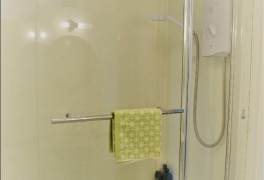 shower moved to opposite end of bath