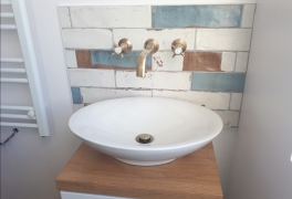 New counter-top basin  with wall-mounted taps