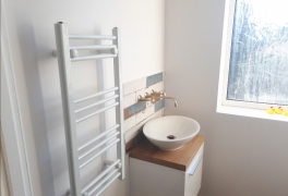 New towel radiator and wall-hung vanity unit