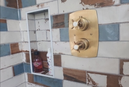 Brass shower valve with storage niche