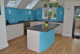 custom-built island unit to accommodate under-counter fridge and freezer